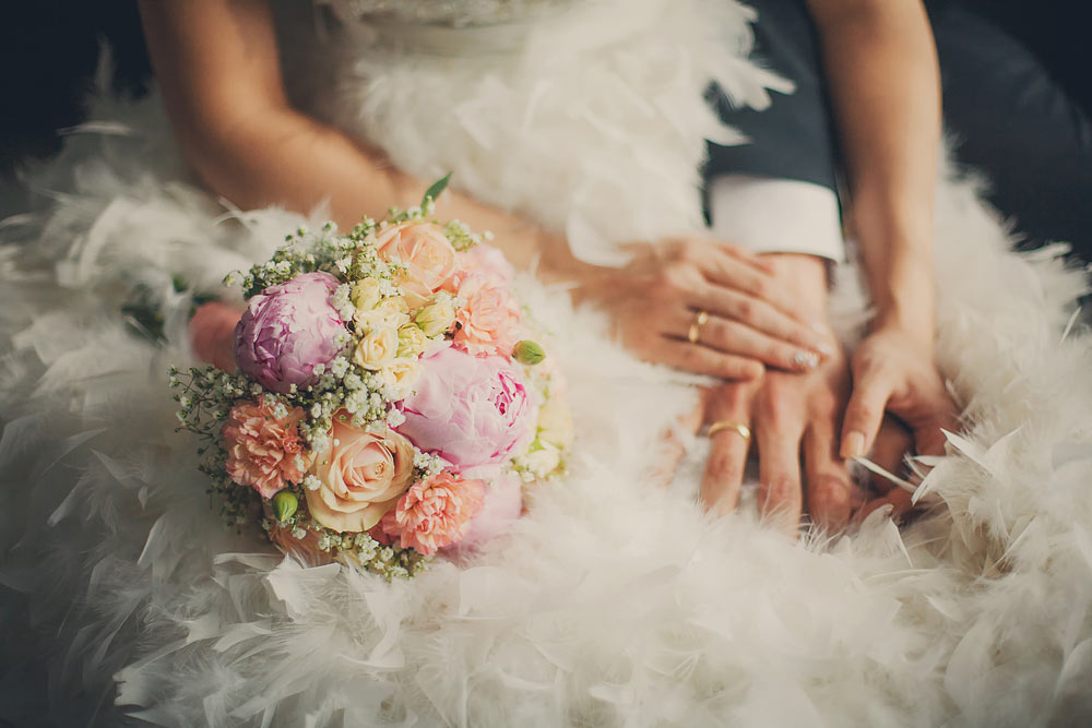 Married Couple Holding Hands